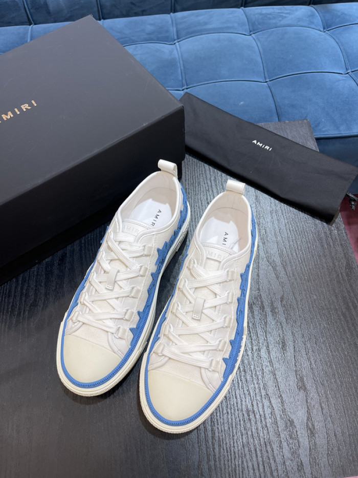 amiri* appliquéd leather and canvas sneakers