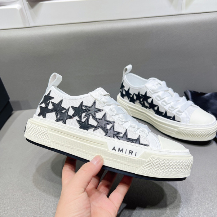 amiri* appliquéd leather and canvas sneakers